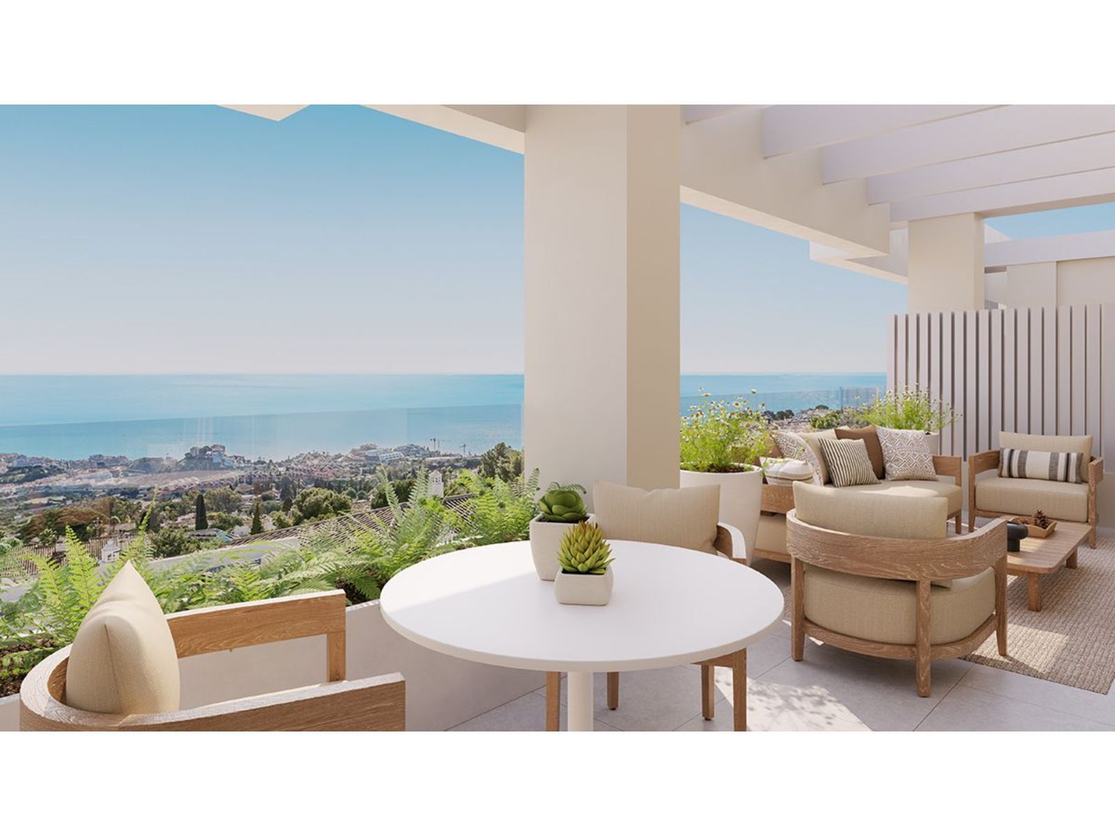 Luxe terras met uitzicht op zee en stijlvolle tuinmeubelen.